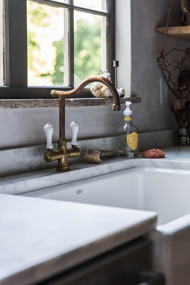 brass faucet and deep sinks