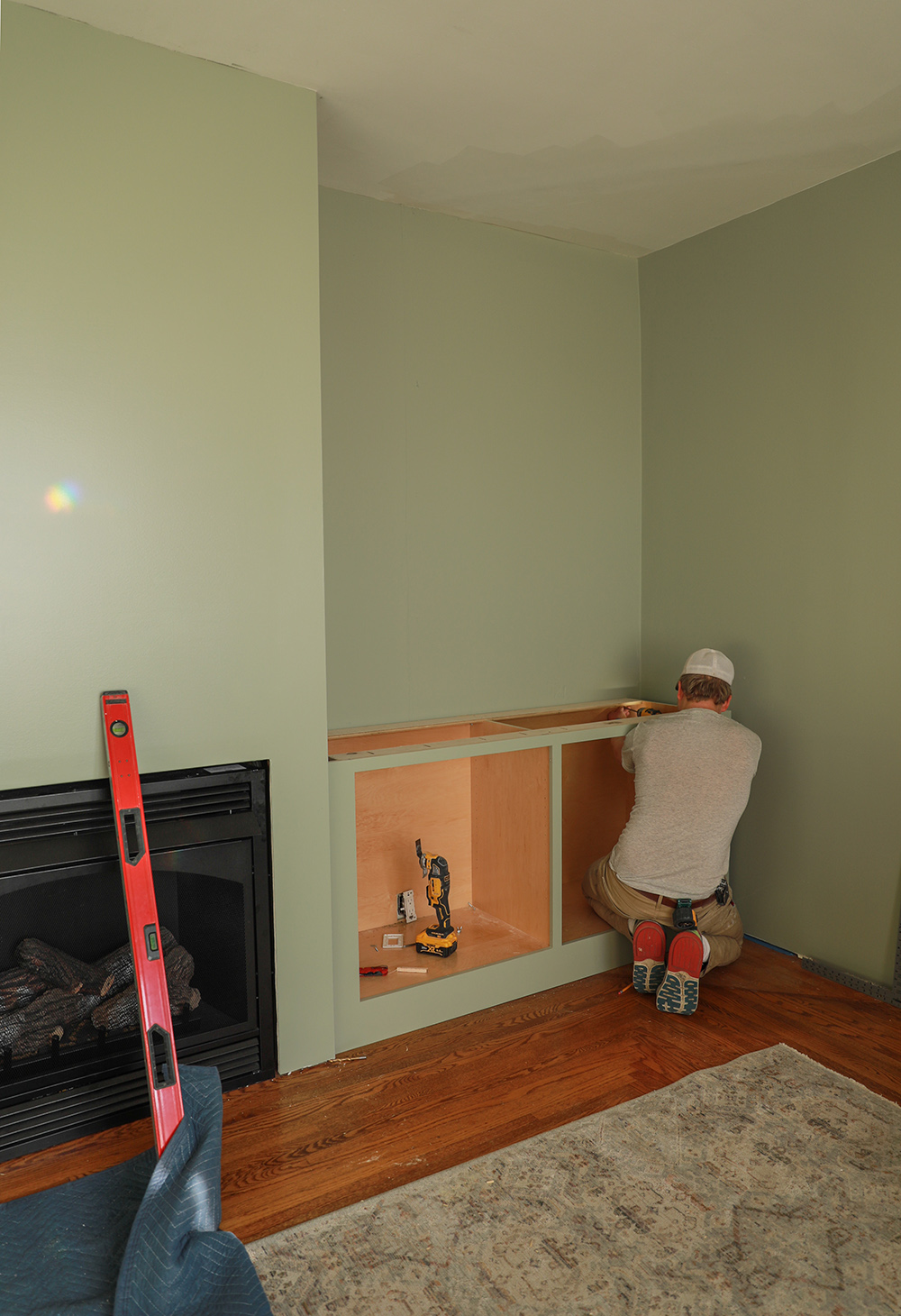 installing cabinets in the living room